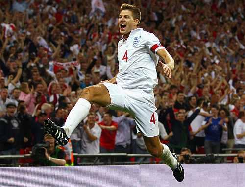 Steven Gerrard of England celebrates after scoring