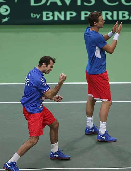 Radek Stepanek and Tomas Berdych of Czech Republic celebrate victory in four sets in their doubles match against Marc Lopez and Marcel Granollers of Spain