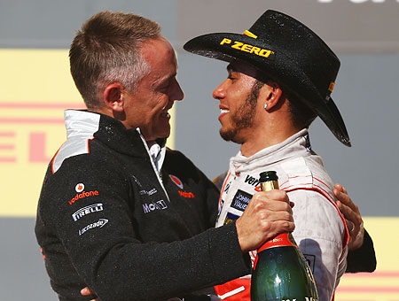 McLaren's Lewis Hamilton celebrates with Team Principal Martin Whitmarsh after winning the US Grand Prix at the Circuit of the Americas on Sunday