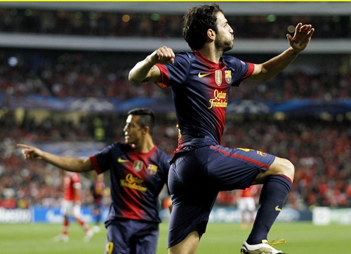 Barcelona's Cesc Fabregas (right) celebrates his goal with teammate Alexis Sanchez