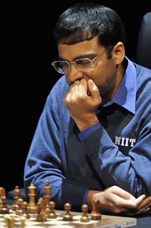 PIX: Vishy Anand celebrates International Chess Day with son - Rediff.com