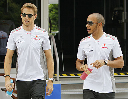 McLaren's Jenson Button (left) with teammate Lewis Hamilton