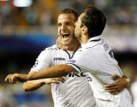 Valencia's Jonas (right) celebrates with teammate Roberto Soldado