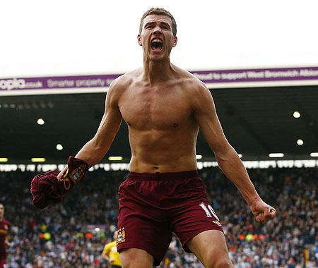 Manchester City's Edin Dzeko celebrates his second goal against West Bromwich Albion on Saturday