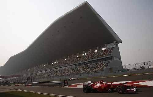 Red Bull Formula One driver Vettel drives out of the pit lane during the practice session