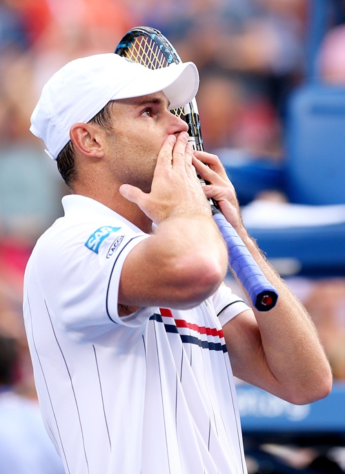 Andy Roddick of the United States waves to the crowd
