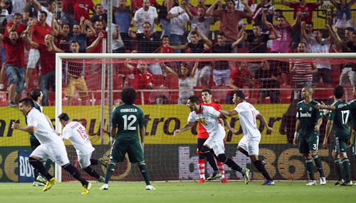 Sevilla's Piotr Trochowski (second left) celebrates after scoring against Real Madrid