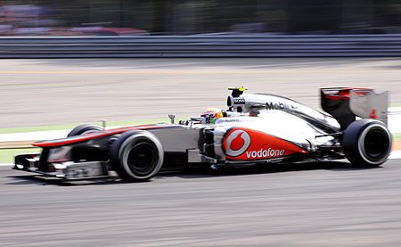 McLaren's Lewis Hamilton drives his car