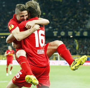 Liverpool's Sebastian Coates and Fabio Borini (left) celebrate