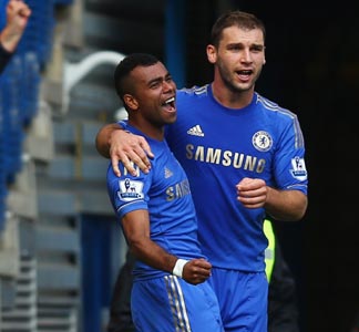 Ashley Cole (left) with Branislav Cole after scoring the goal
