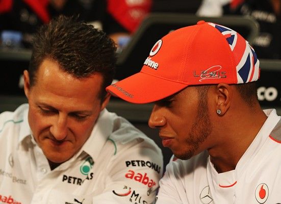 Lewis Hamilton (right) with Michael Schumacher