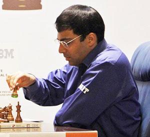 PIX: Vishy Anand celebrates International Chess Day with son - Rediff.com