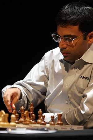 PIX: Vishy Anand celebrates International Chess Day with son - Rediff.com