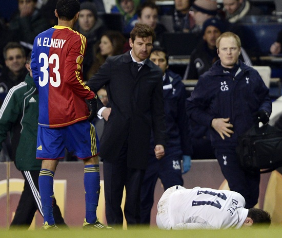 Tottenham Hotspur's Gareth Bale lies injured