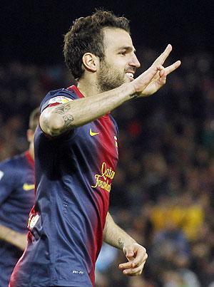 Barcelona's Cesc Fabregas celebrates a goal against Mallorca during their La Liga match at Camp Nou stadium in Barcelona on Saturday