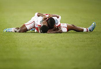 VfB Stuttgart's players celebrate after winning against SC Freiburg in their German Cup (DFB Pokal) semi-final match in Stuttgart on Wednesday