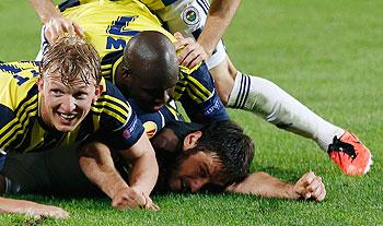 Fenerbache's players celebrate a goal on Thursday