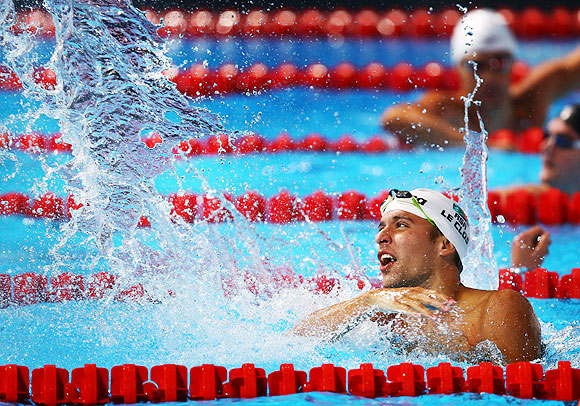 Chad Le Clos of South Africa celebrates after winning the Swimming Men's 200m Butterfly final on Wednesday