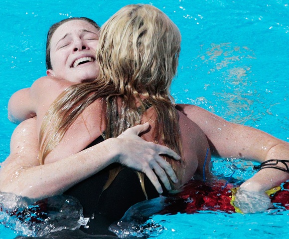 Cate Campbell of Australia (left) is congratulated by Britta Steffen of Germany