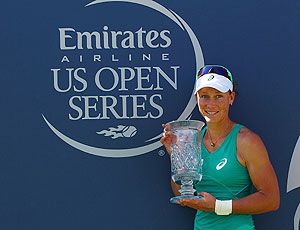 Samantha Stosur of Australia poses with the trophy after beating Victoria Azarenka of Belarus at the Southern California Open in Carlsbad, California on Sunday