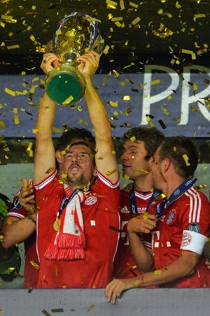 Franck Ribery lifts the trophy