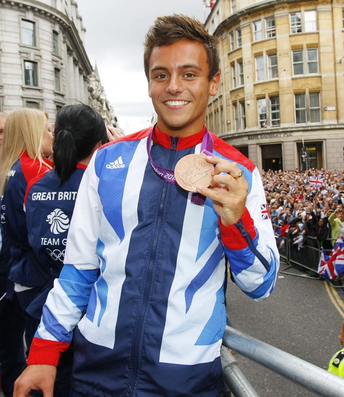 British Olympic bronze medal winning diver Tom Daley smiles during the London 2012 Victory Parade