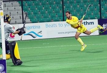 Ramandeep Singh scores India's opening goal against Argentina