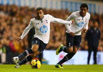 Aaron Lennon and Paulinho of Tottenham Hotspur on the ball during the Barclays Premier League match against Liverpool at White Hart Lane