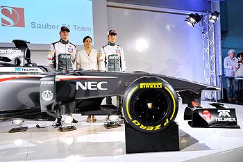 Sauber F1 driver Nico Hulkenberg of Germany, Sauber Team Principal Monisha Kaltenborn, and Sauber F1 driver Esteban Gutierrez of Mexico unveil the Sauber C32-Ferrari new car for the 2013 F1 season