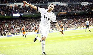 Real Madrid's Karim Benzema celebrates after scoring against Valencia during their King's Cup quarter-final round one match on Wednesday