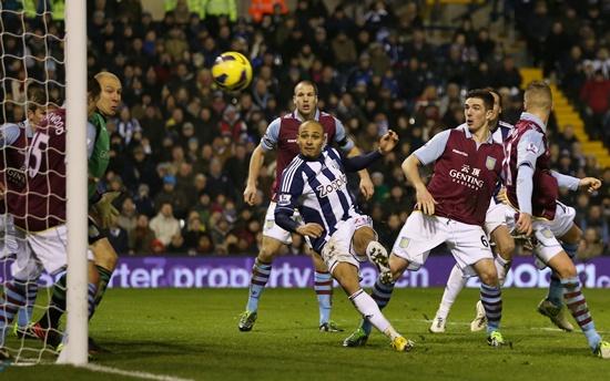 Peter Odemwingie of West Bromwich Albion scores their second goal