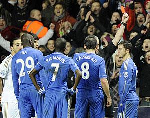 Chelsea's Eden Hazard (right) is sent off during their English League Cup semi-final second leg match against Swansea on Wednesday