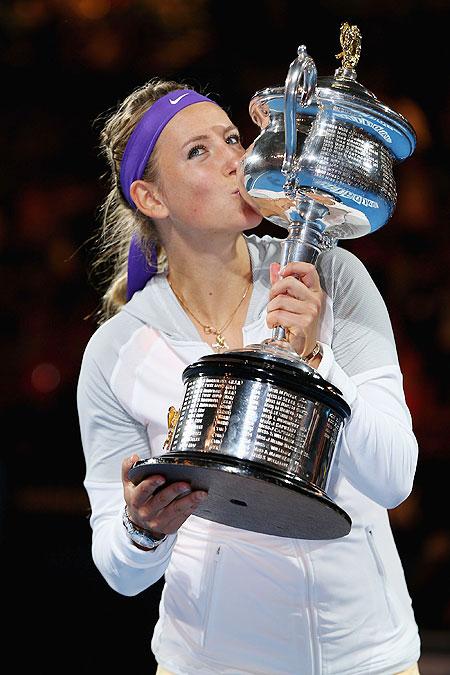 Victoria Azarenka of Belarus poses with the Daphne Akhurst Memorial Cup after winning the 2013 Australian Open on Saturday