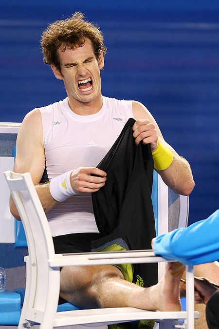 Andy Murray receives medical attention to his foot during the final on Sunday