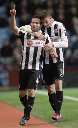 Yohan Cabaye of Newcastle United celebrates scoring the second goal against Aston Villa at Villa Park