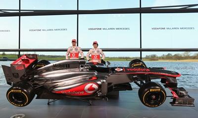 McLaren Mercedes Formula 1 drivers Jenson Button of Great Britain and Sergio Perez of Mexico unveil the Mercedes McLaren MP4-28 at the McLaren technology centre in Woking, England.