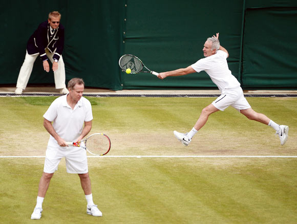 John McEnroe (right) in action with Patrick McEnroe