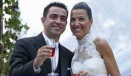 Barcelona midfielder Xavi with wife Nuria Cunillera