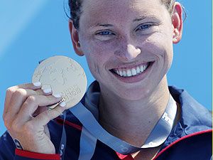 Winner Haley Danita Anderson of the U.S. holds her gold medal after the women's 5km open water race during the World Swimming Championships in Barcelona on Saturday