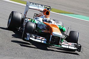 Adrian Sutil of Germany and Force India drives