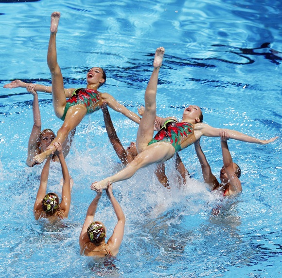 Japan's team perform in the synchronised swimming free combination routine