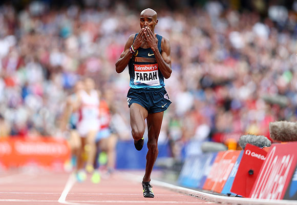 Mo Farah of Great Britain celebrates as he crosses the line in first place in the Men's 3000m during day two of the Sainsbury's Anniversary Games - IAAF Diamond League 2013 at The Queen Elizabeth Olympic Park in London on Saturday