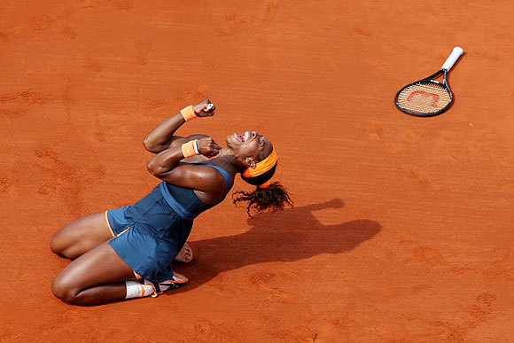 Serena Williams celebrates match point during   her women's singles final against Maria Sharapova on Saturday