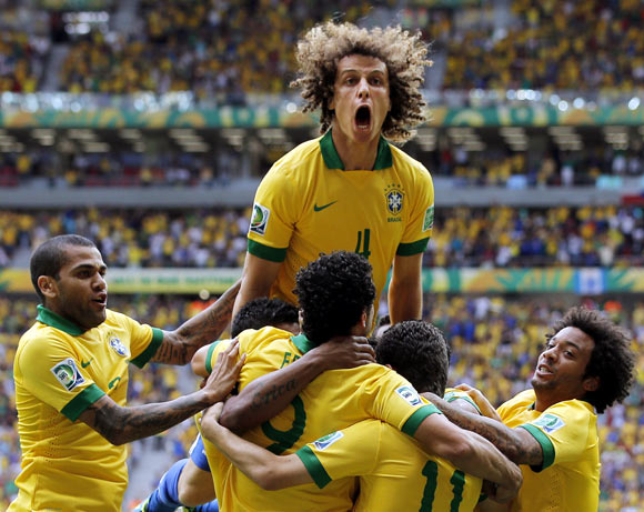 Brazil's players celebrate a goal