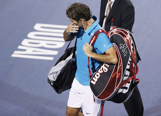 Roger Federer of Switzerland leaves the court