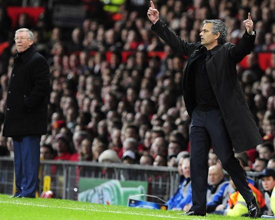 Real Madrid coach Jose Mourinho (right) gestures as Manchester United manager Alex Ferguson watches