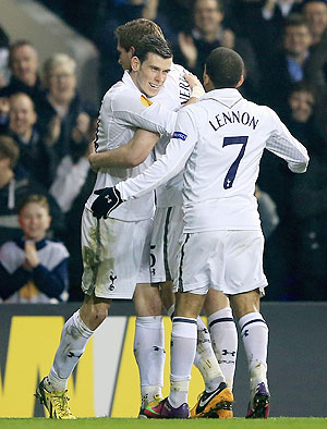 Tottenham Hotspur's Jan Vertonghen celebrats with Gareth Bale (left) and Aaron Lennon during the UEFA Europa League Round of 16 first leg against Inter Milan at White Hart Lane on Thursday