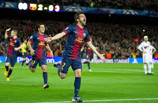 David Villa of FC Barcelona celebrates scoring their third goal