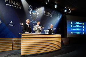 Gianni Infantino, UEFA General Secretary, Steve McManaman, UEFA Champions League Final Ambassador, and Giorgio Marchetti, UEFA Competition Director, draw the last ball during UEFA Champions League quarter-finals draw at the UEFA headquarters in Nyon, Switzerland on Friday