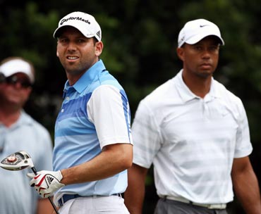 Sergio Garcia (left) with Tiger Woods